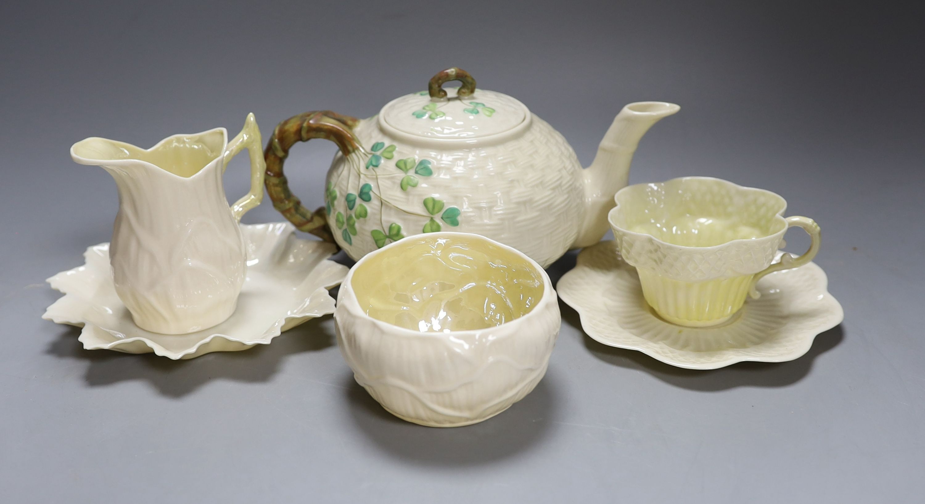 Matching Belleek sugar bowl milk jug and dish together with another Baleek cup and saucer and teapot (6)
